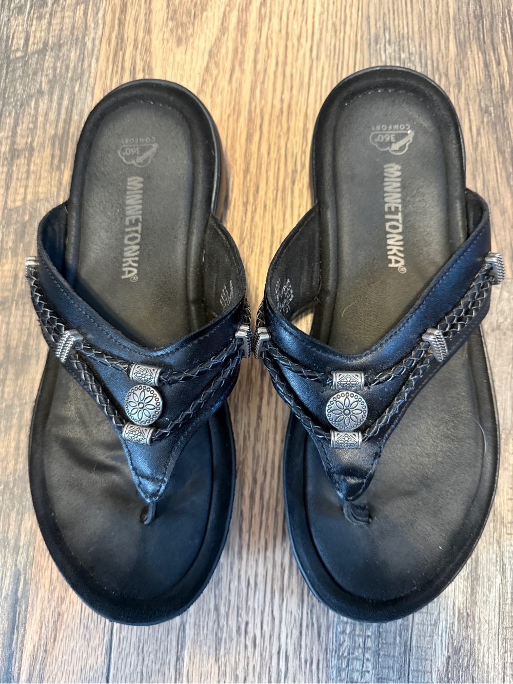 Minnetonka Black Braided Leather Thong Sandals with Decorative Conchos